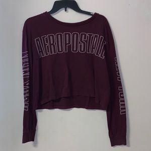 Cropped long sleeve shirt. Lightly worn